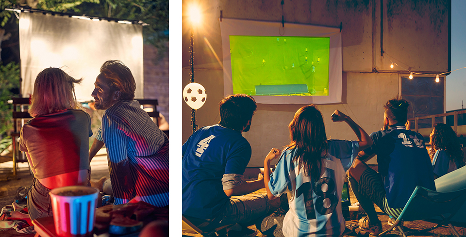außenbereich, projektorbildschirm, fußball fans, lagerfeuer-setup, zusammenkunft