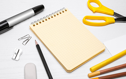 notebook, spiral notebook, yellow scissors, scissors, pencil